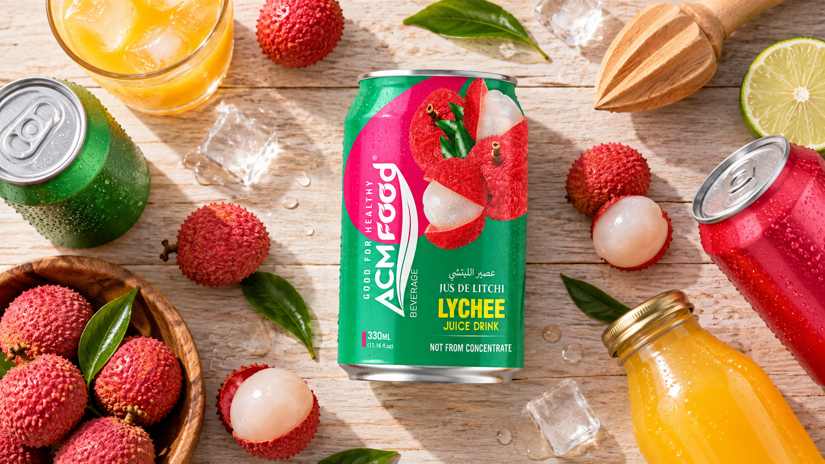 Overhead flat lay of assorted unbranded beverage cans and bottles arranged on a pale wooden surface beside fresh whole fruit and a wooden juicer, soft natural daylight, clean commercial product photography, landscape composition, no readable text