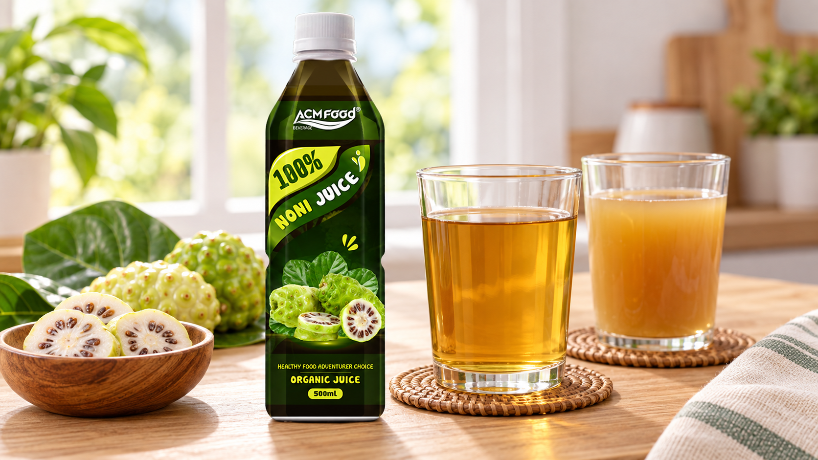 Two clear glasses of golden-brown juice on a light wooden table, one clear and one slightly cloudy, with a small bowl of sliced tropical fruit nearby, soft diffused window light, realistic commercial beverage photography, 16:9 landscape, no text, no logos